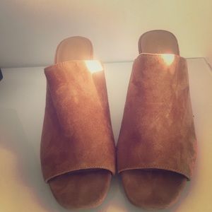 Calvin Klein Cicelle peep-toe camel mules.